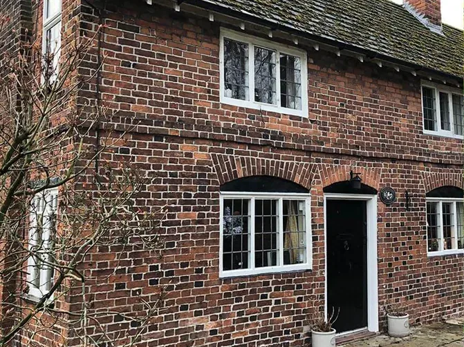 Traditional cottage brickwork before specialist colour matching.