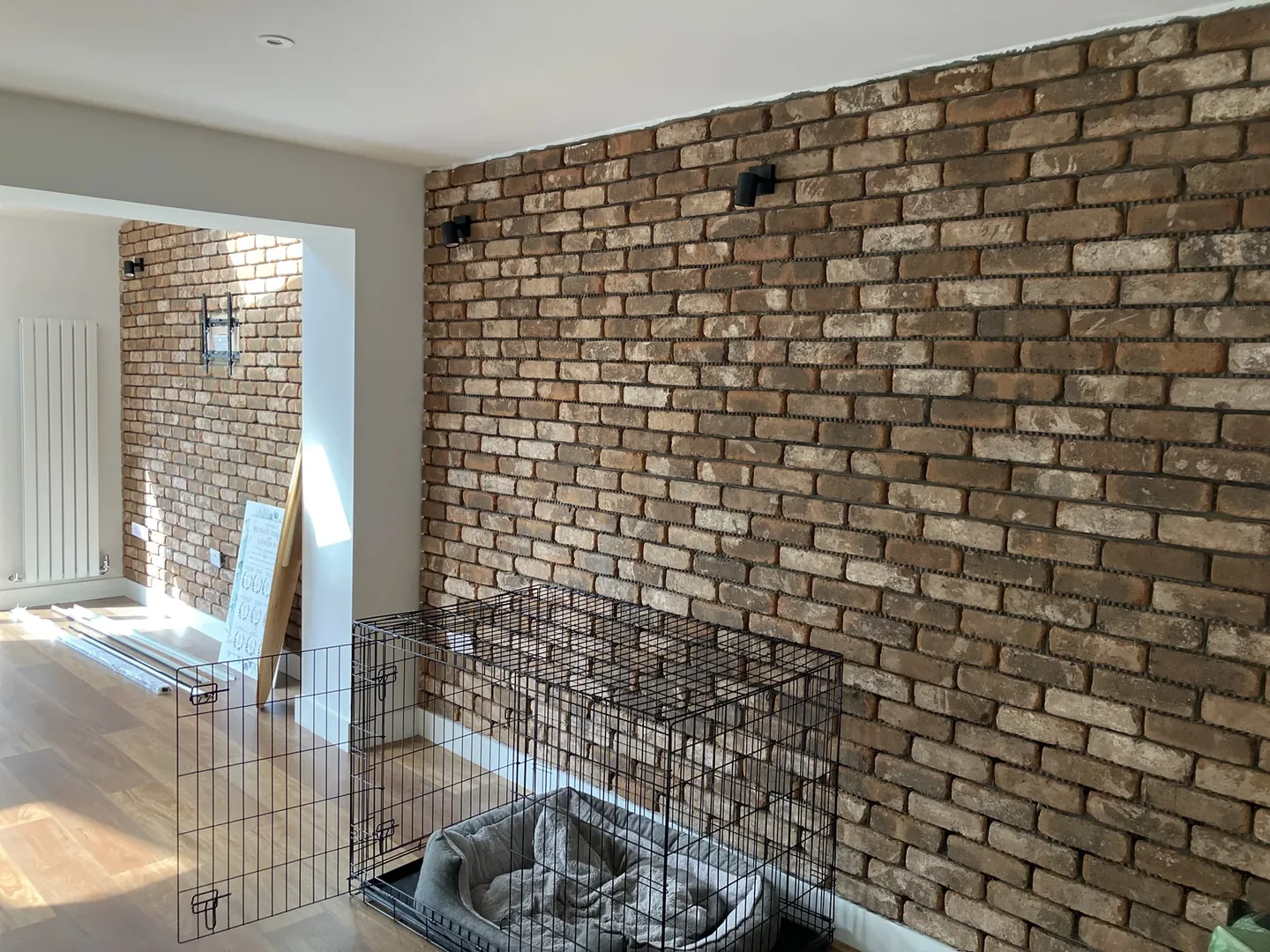 Interior exposed brick feature wall before repointing.