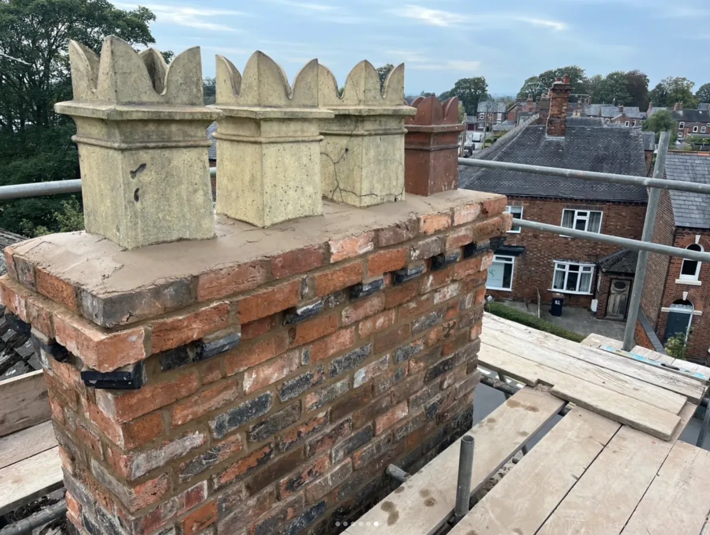 Victorian chimney stack during mortar repair and repointing.